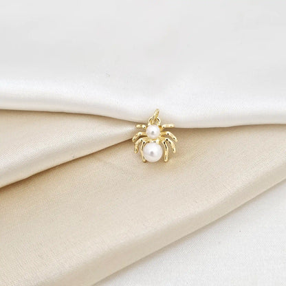 Dije Araña Dorado Con Perlas Rf K7097