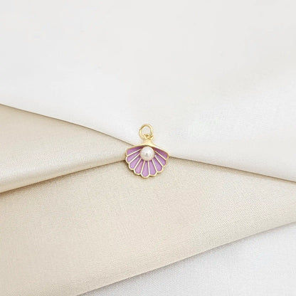 Dije Concha Morado Y Dorado Con Perla Rf K7137