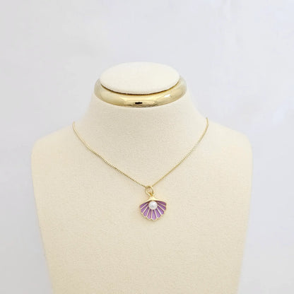 Dije Concha Morado Y Dorado Con Perla Rf K7137