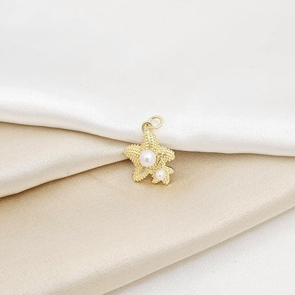 Dije Doble Estrella De Mar Dorado Con Perlas Rf K7100