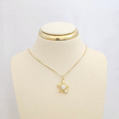Dije Doble Estrella De Mar Dorado Con Perlas Rf K7100