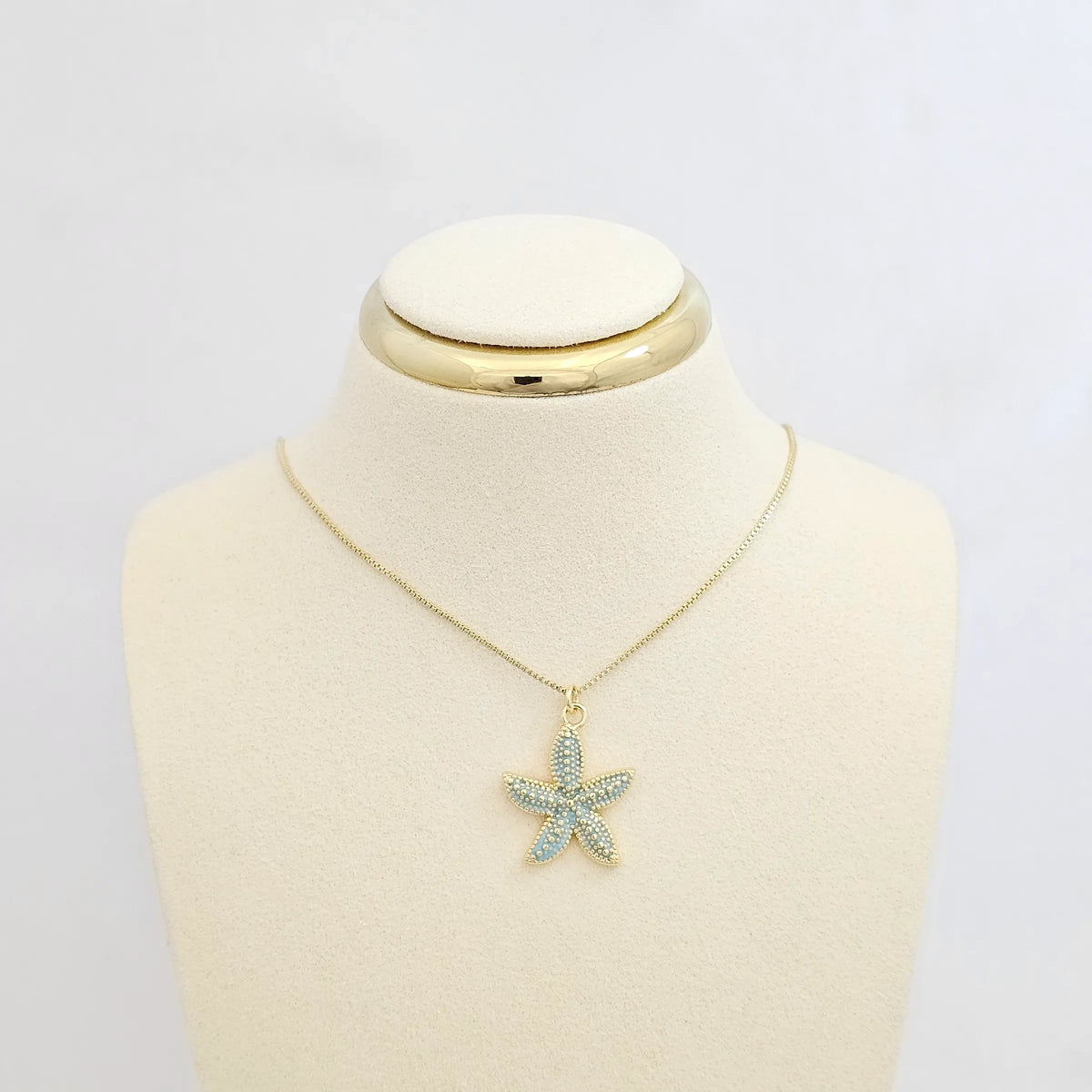 Dije Estrella De Mar Verde Claro Y Dorado Rf K7135