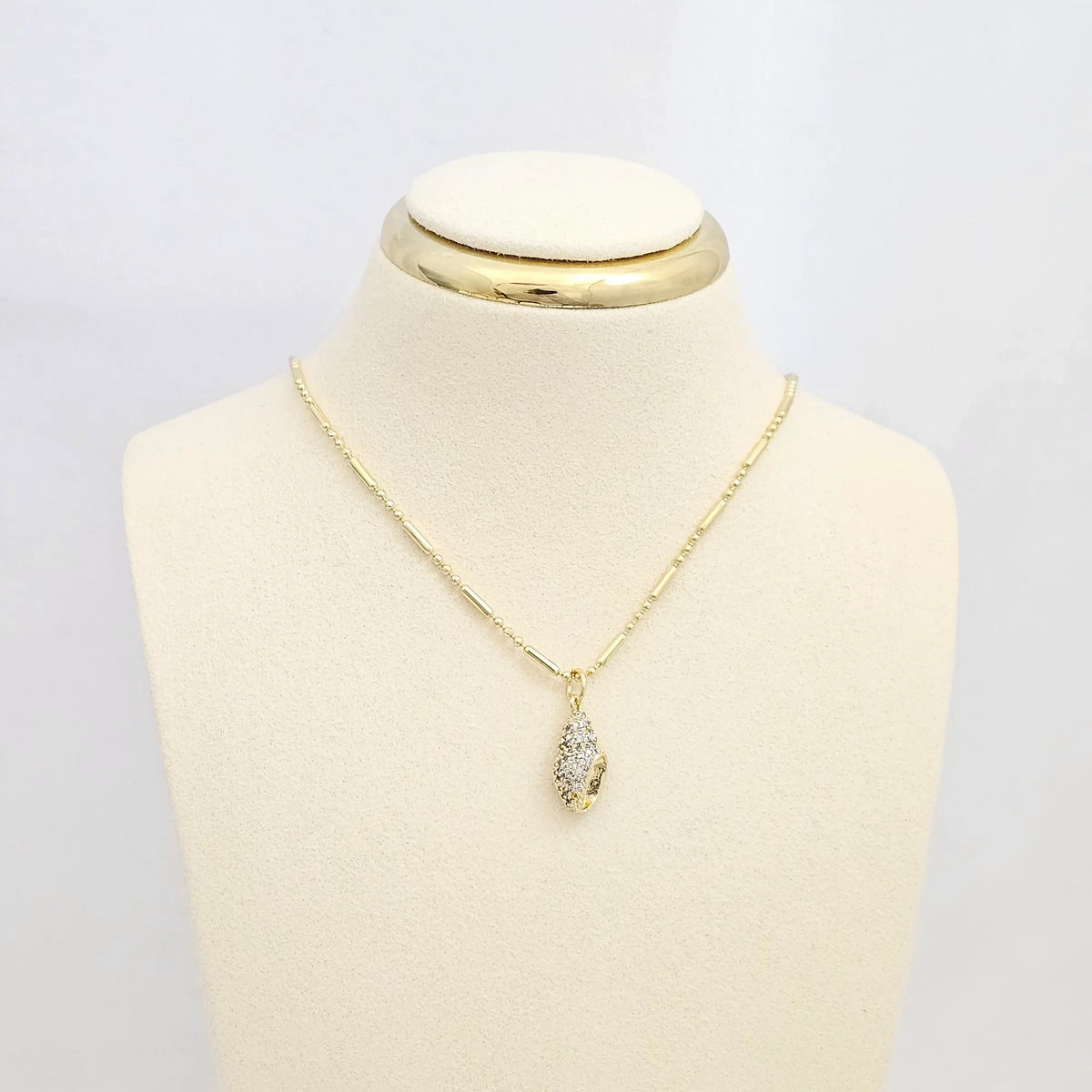 Dije Mini Caracola Circones Dorado Rf K6692