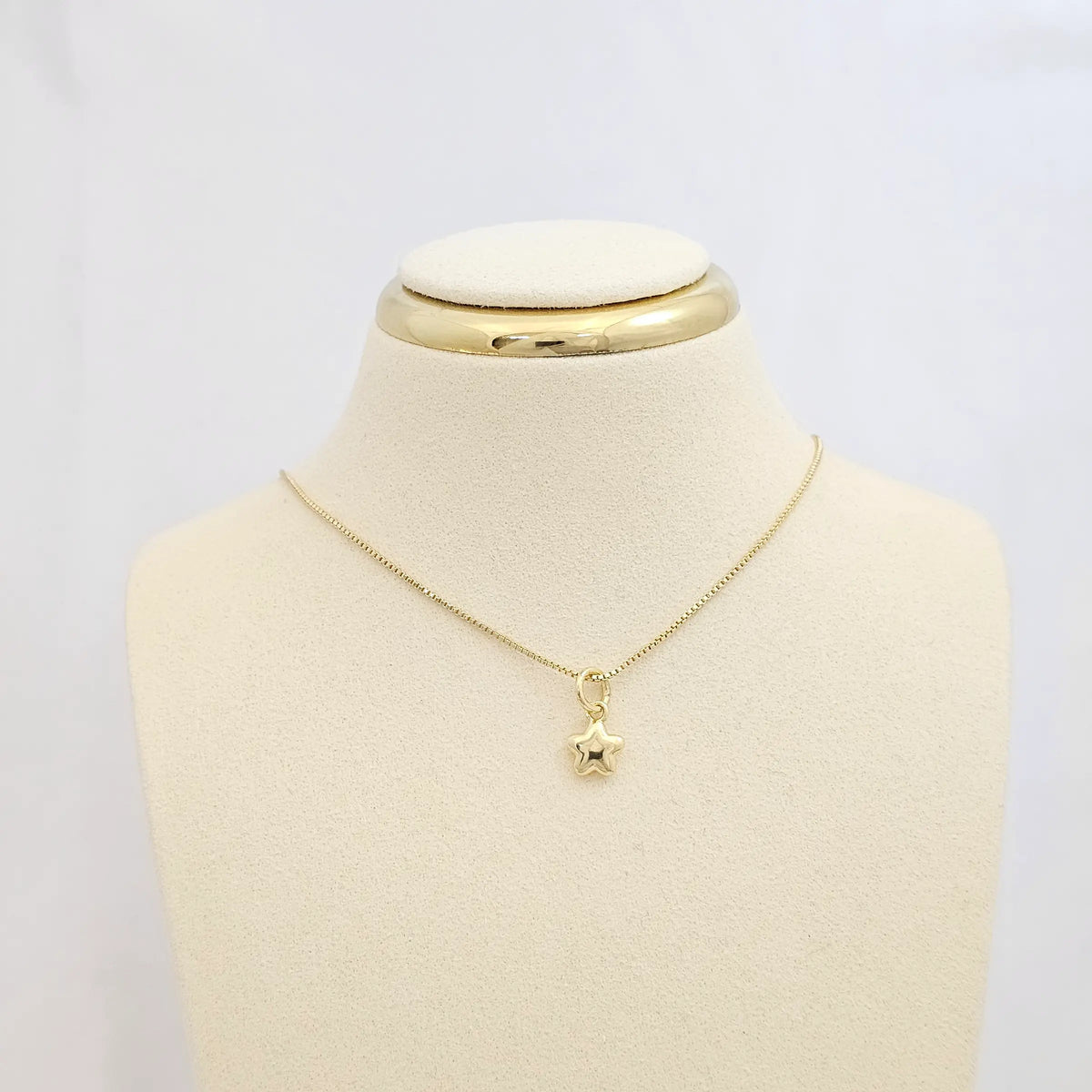 Dije Mini Estrella Lisa Dorado Rf K7102