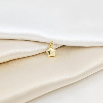 Dije Mini Estrellita Lisa Dorado Rf K7087