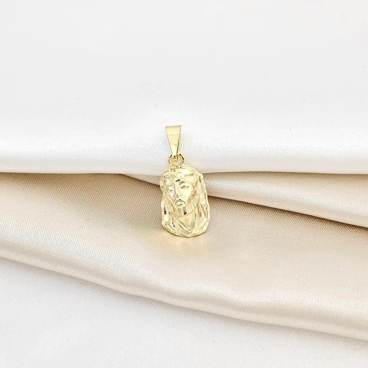 Dije Rostro Mediano Tallado Lam 18K-24552