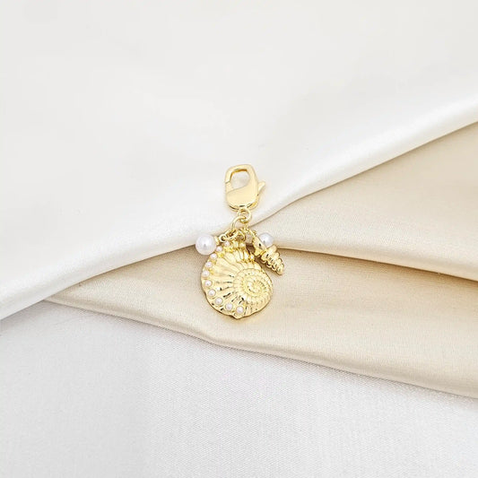 Llavero Doble Caracol Con Perlas Dorado Rf K6942