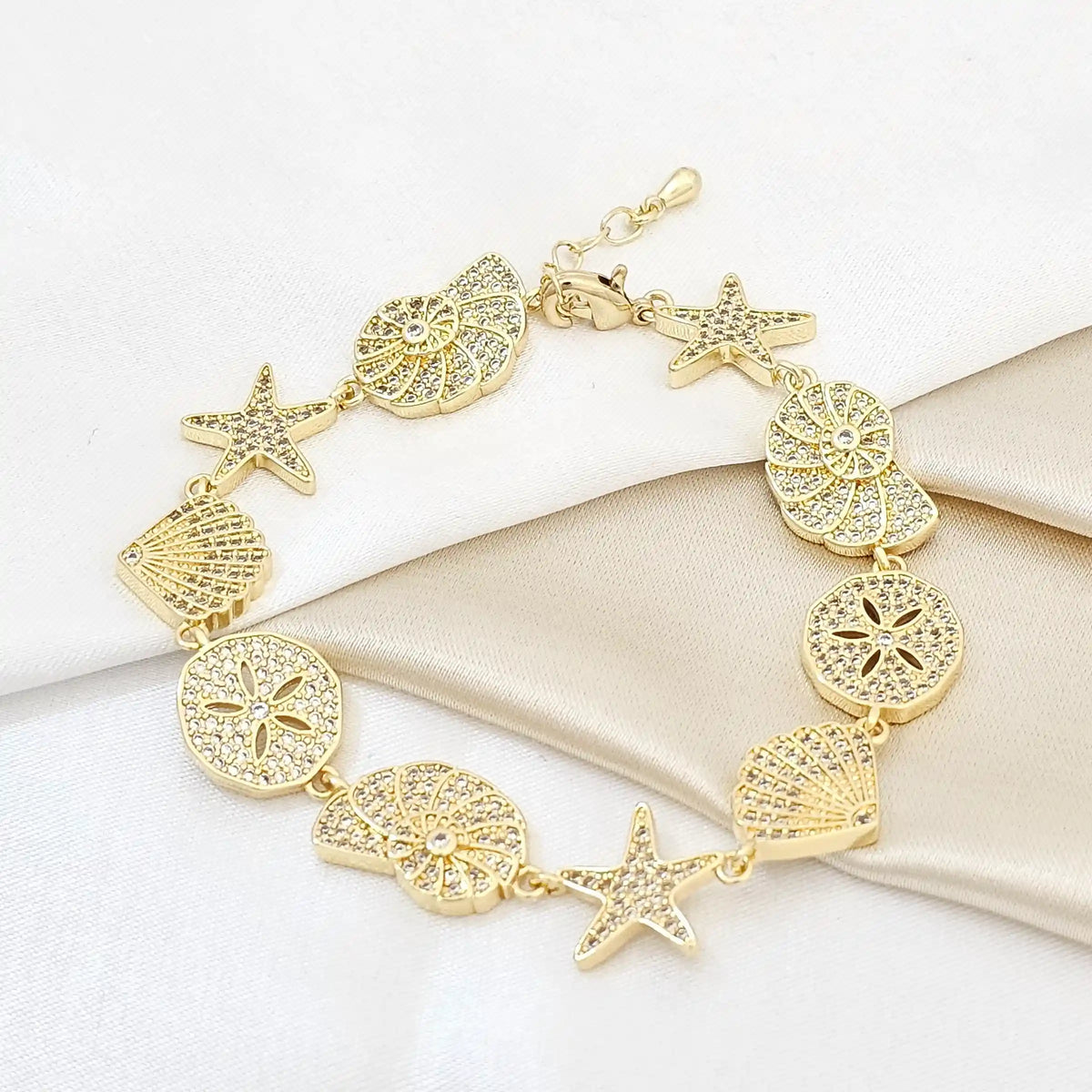 Pulsera Concha Caracol Y Estrella Circones Dorado Rf K5439