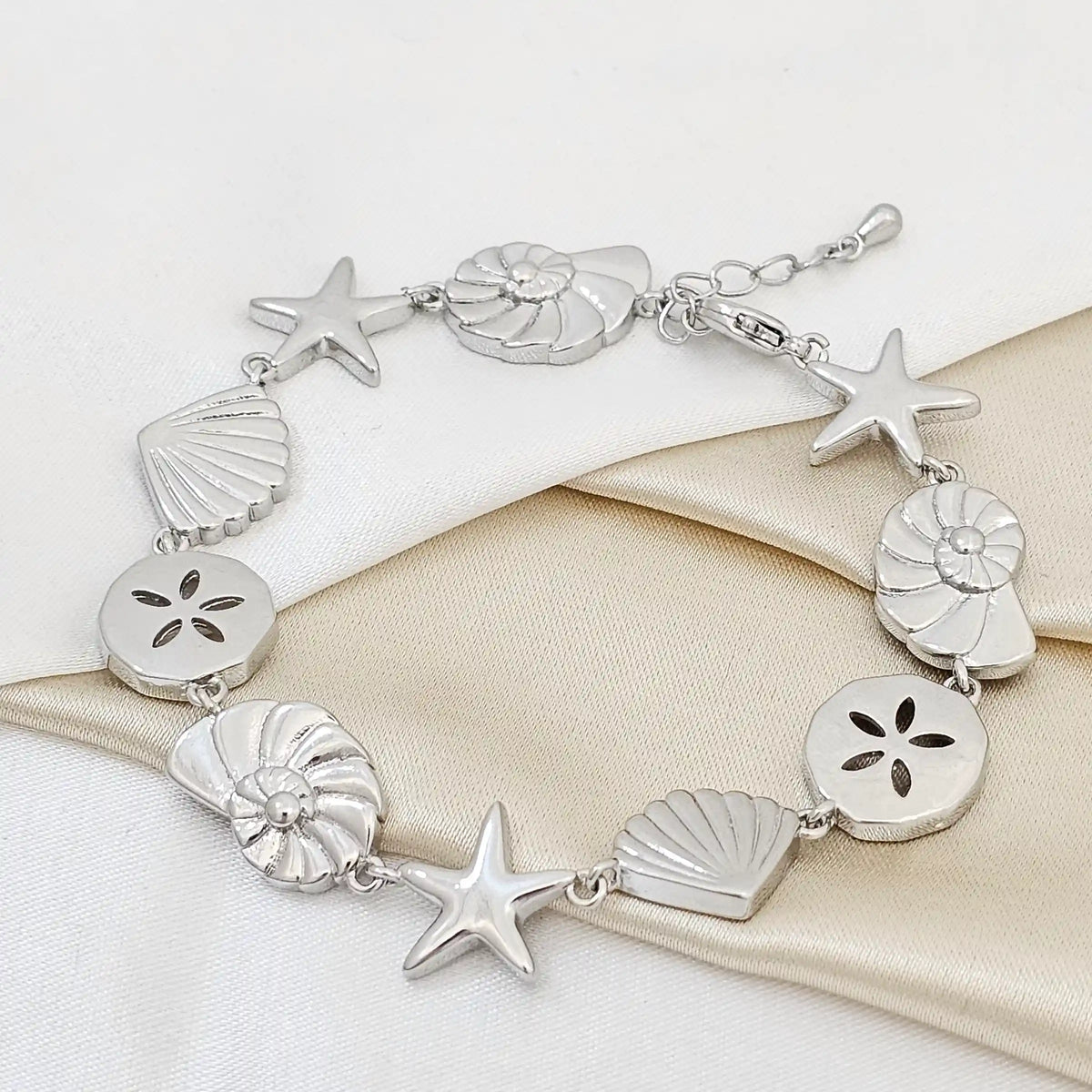 Pulsera Concha Caracol Y Estrella Plateado Extensor Rf K5438
