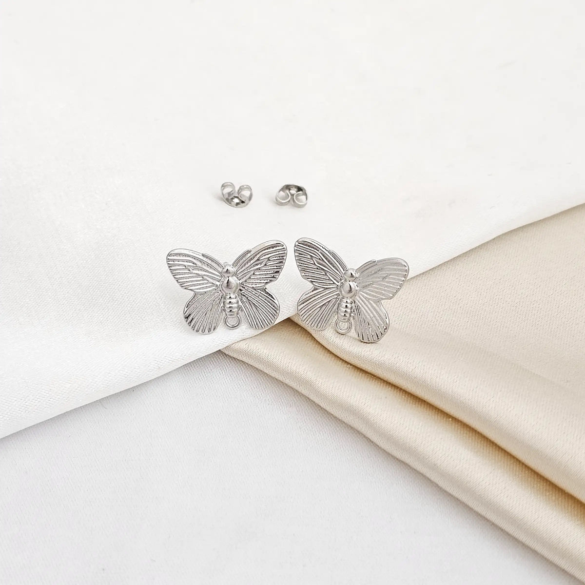 Topo Mariposa Mediana Plateado Rf K5238