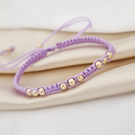 PULSERA GOLD  MACRAME # 4 ..3 BALINES LILA
