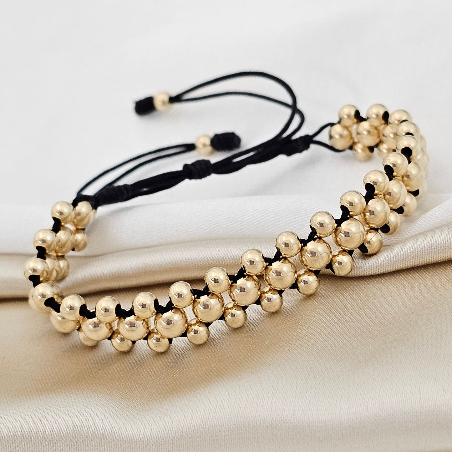 PULSERA GOLD TRES CARRILES  #5- 4 NEGRA